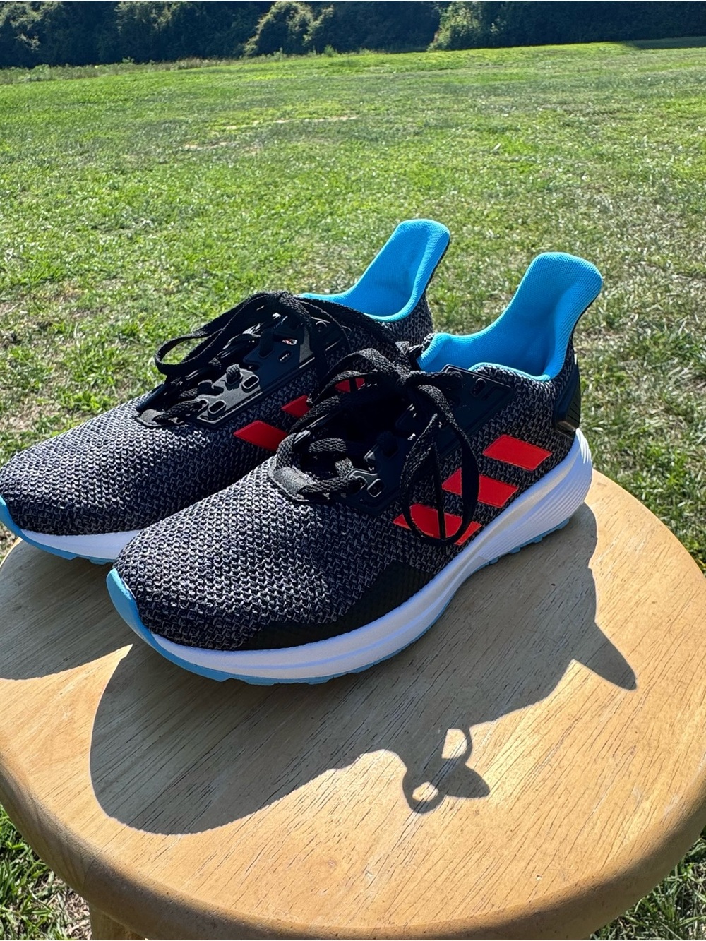 Kids Adidas Duramo Black Running Shoes with Red Stripes and Blue Lining